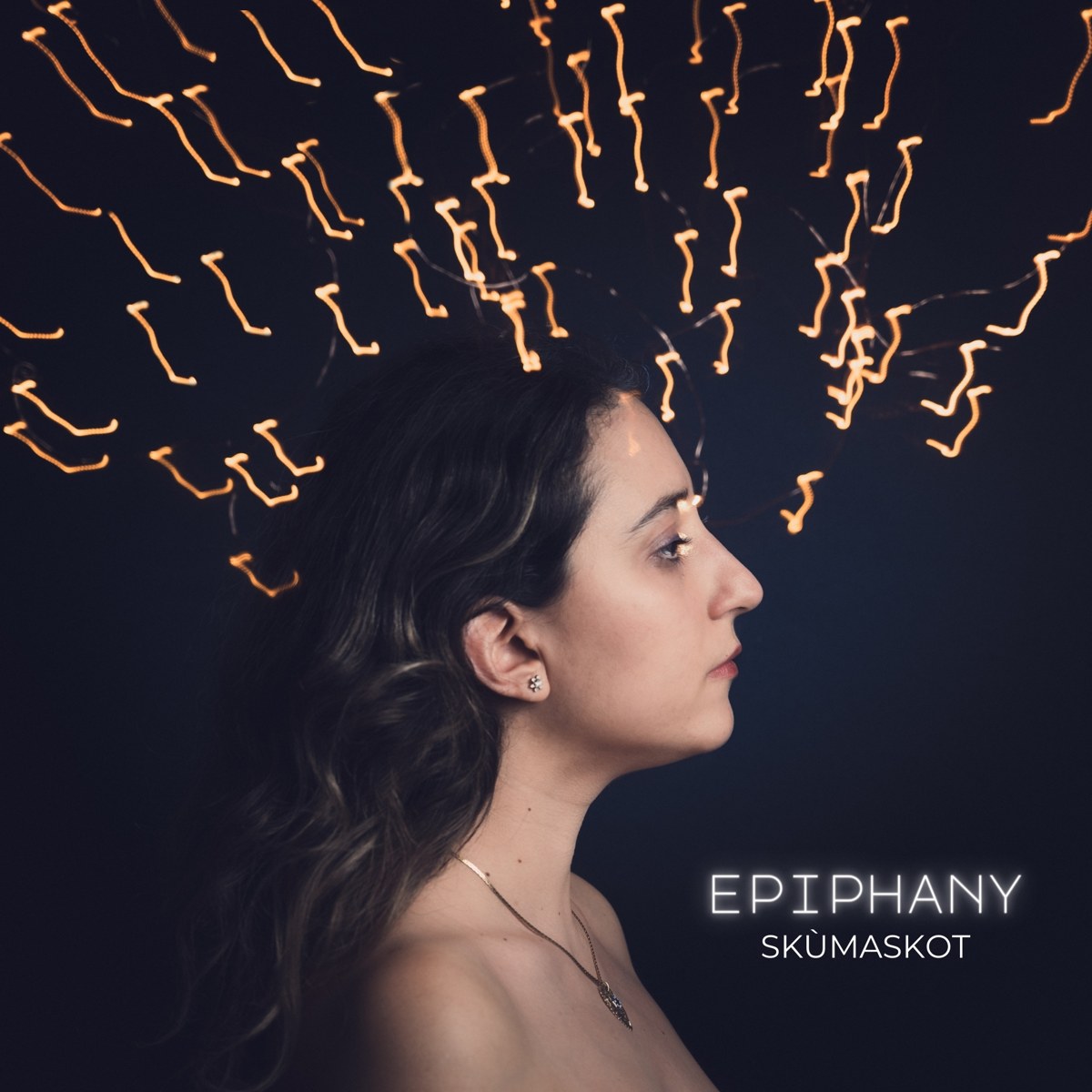 Epiphany cover artwork: Skùmaskot beneath trails of golden light